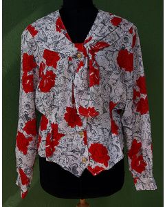 Bluse fra Brandtex i str. 38. Flot blomsterprint. Str. 38. Ubrugt