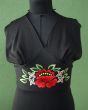 Lang, sort vintage selskabskjole med flot broderi under barmen, str. 36, her ses overdelen i close up.