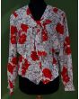 Bluse fra Brandtex i str. 38. Flot blomsterprint. Str. 38. Ubrugt