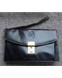 Sort vintage clutch i skind, unisex, velholdt og opbevaret røgfrit