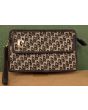 Brun vintage clutch i vinyl og stof, velholdt
