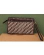 Brun vintage clutch i vinyl og stof, velholdt, her set bagfra